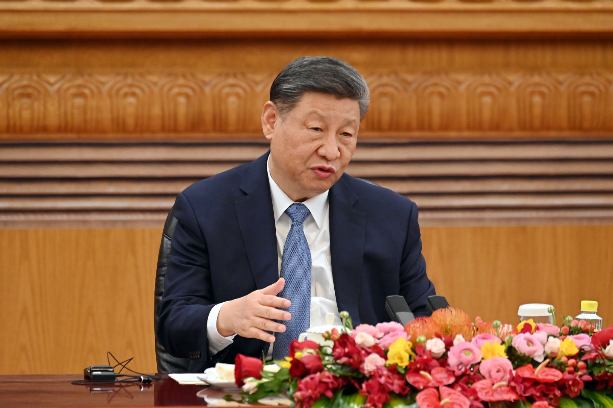 Chinas Staatschef Xi Jinping wirbt vor internationalen Top-Managern für die Volksrepublik als Standort.